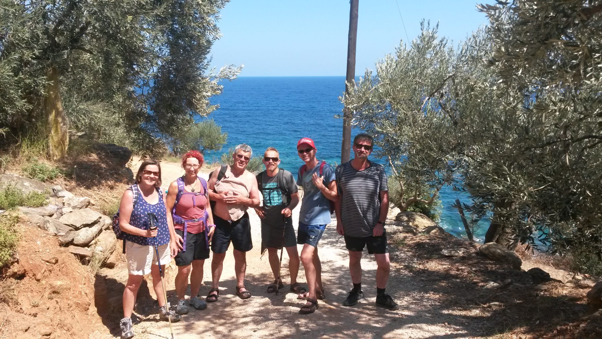 Merry bunch of walkers skillfully led to the edge of paradise by their guide Michelle Brydie